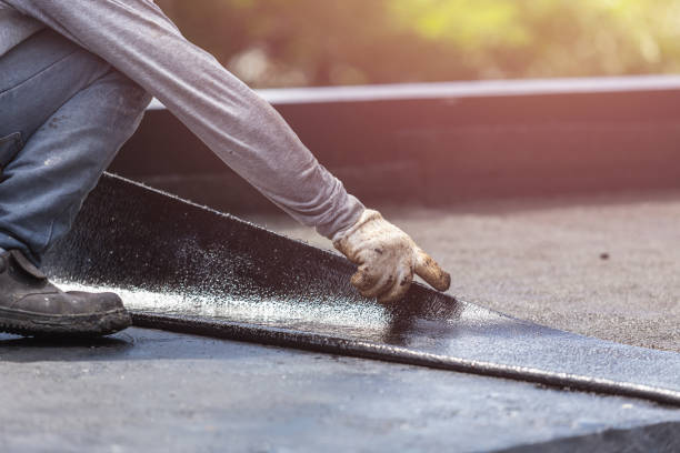Professional Exterior Waterproofing technician working in Erie, IL